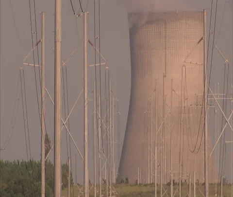 McBean, Georgia; nuclear power station cooling tower and transmission lines Stock Footage 86693482