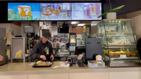 McDonald's customer picking up dining orders Stock Footage 230718797