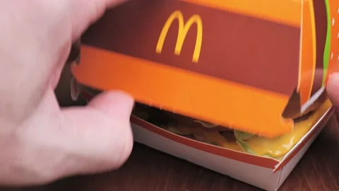 Mcdonalds hamburger opening close-up Stock Footage 224813825