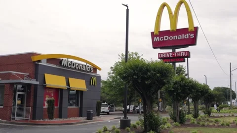 McDonald's logo. McDonald's is the world's largest chain of hamburger fast .. Stock Footage 335224775