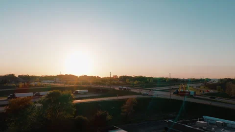 McDonald's Sign at Interstate Interchange Sunset, DeForest Wisconsin Aerial Stock Footage 342061095