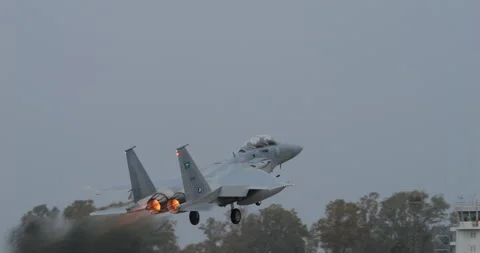 McDonnell Douglas F-15 Eagle Fighter Jet of Saudi Air Force Takes Off on Rainy Stock Footage 246597335
