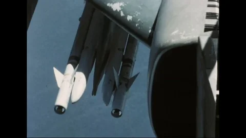 McDonnell Douglas F-4D Phantom II flies off after fueling from KC-135A - 1967 Stock Footage 103757921