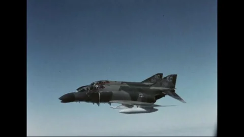 McDonnell Douglas F-4D Phantom II aircrafts fly in the sky - 1967 스톡 동영상 103758370