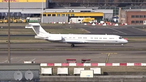 Mcdonnell douglas md 87 corporate jet taxiing taxiway brussels airport zaventem Stock Footage 294051727