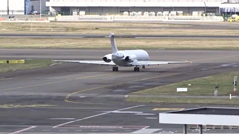 Mcdonnell douglas md 87 corporate jet taxiing taxiway brussels airport zaventem Stock Footage 294051862