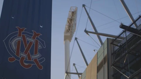 MCG Flag slide and focus pull to the MCG stadium Stock Footage 106599970