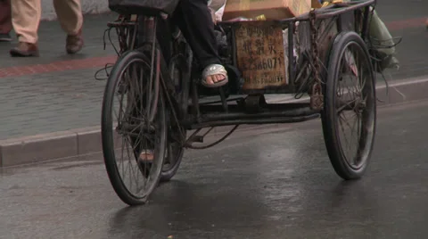 MCU bicycle wheels and pedalling feet Stock Footage 37695622