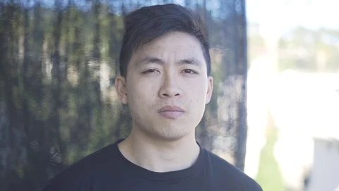 MCU Male Looking at Camera Stockbeeldmateriaal 72840378