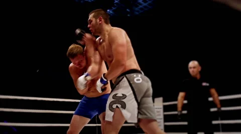 M.DEMIDOV win E.Myakinkin on Mixed MMA fight. The winner celebrates victory' cry Stock Footage