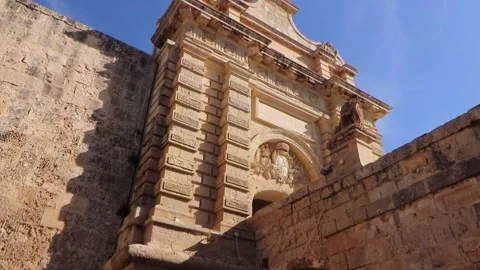 Mdina Gate, also known as the Main Gate or the Vilhena Gate, is the main gate in Stock Footage 236542286