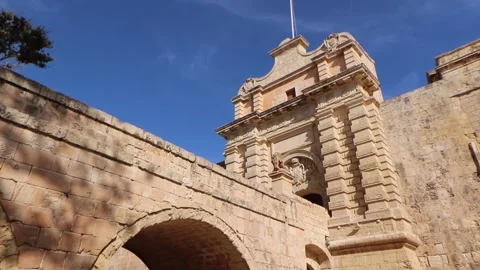 Mdina Gate, also known as the Main Gate or the Vilhena Gate, is the main gate in Stock Footage 236542297