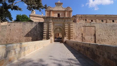 Mdina Gate, also known as the Main Gate or the Vilhena Gate, is the main gate in Stock Footage 236545110