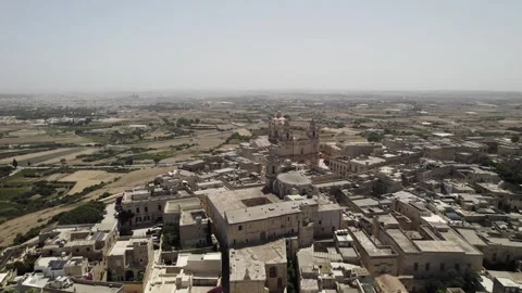 Mdina, Malta Aerial pull back and rotate Stock Footage 248010434