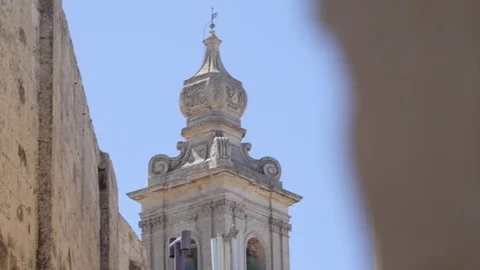 Mdina,Malta  Low angle of a medieval belfry at daylight Stock Footage 88844356