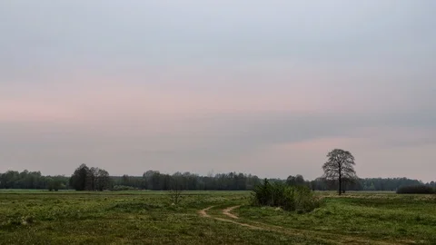 Meadow in eastern Europe, clouds moving in the sky.  Stock Footage 107099340
