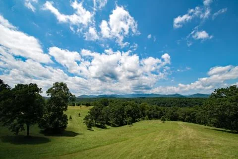 Meadow with Mountains Stock Photos