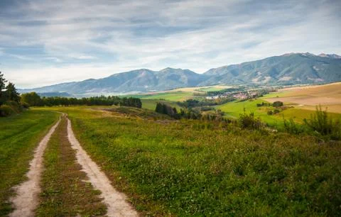 Meadow path, hills Stock Photos