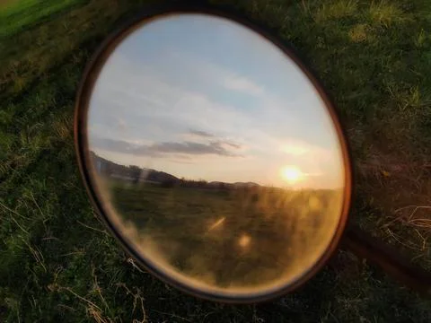 Meadow Reflected in Rearview Mirror Stock-Fotos