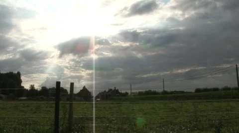 Meadow, sun breaks through clouds Stock Footage 836060