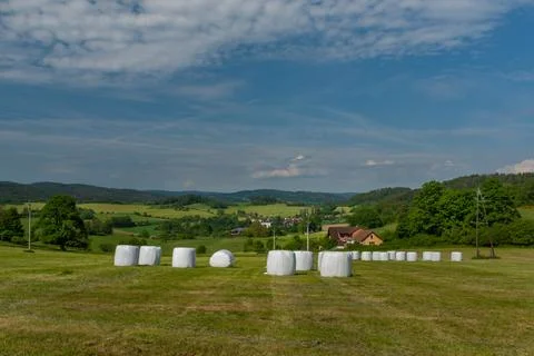 Meadows and fields between Vacov and Ckyne towns in Sumava mountains Stock Photos