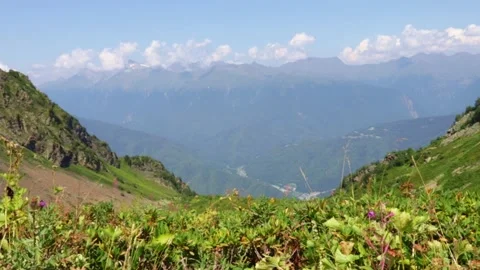 Meadows and fields. Mountain landscape with green grass and sky. Stock Footage 161101847