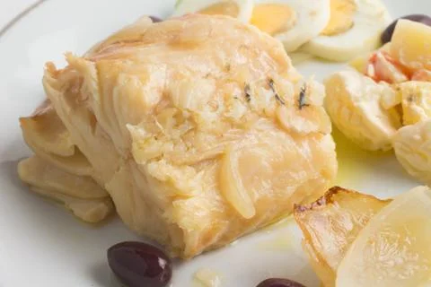 Meal of Boiled Cod Fish Stock Photos