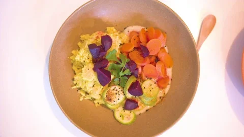 Meal in bowl kept on table Stock-Footage 76138740