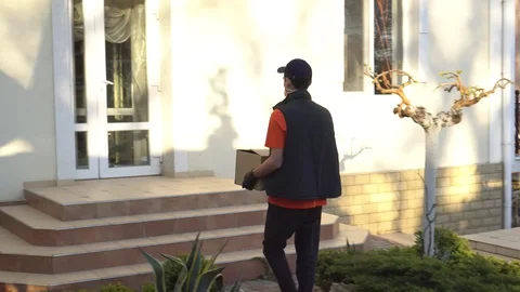 Meal delivery program for seniors in need amid coronavirus pandemic. Volunteer Stock Footage 129126482