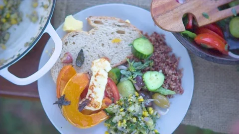 Meal in plate on table Stock Footage 76136515