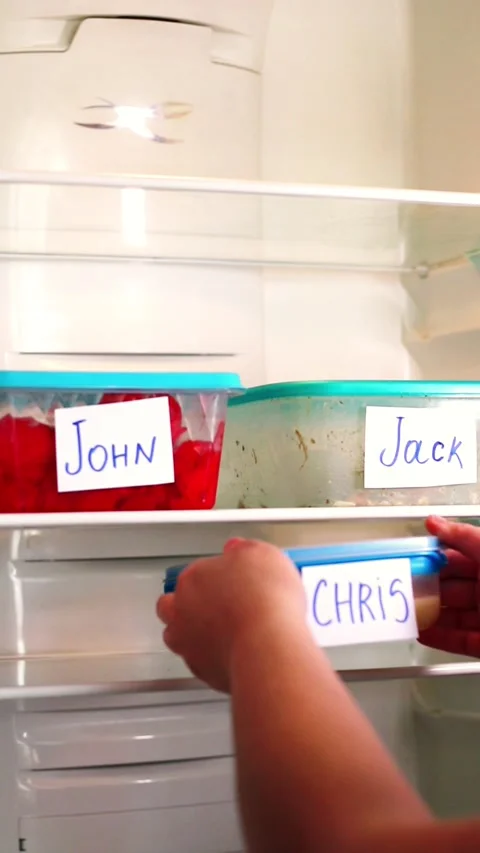 Meal prep containers in office refrigerator. Ideal for time management content Stock Footage 311893759