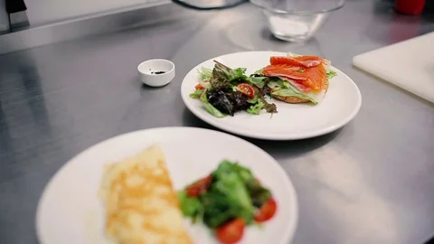 Meals are on an iron table in the kitchen. Stock Footage