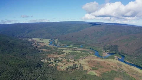 Meandering River Flowing into the Ocean Stock Footage 303082597
