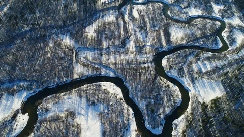 Meandering River Flows Through Plain Among Woodland Stock Footage 75631451