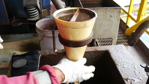 Measure mud viscosity with Marsh funnel viscometer Stock Footage 71098771