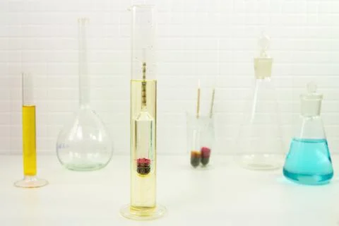 Measurement of solution density with a hydrometer Stock Photos