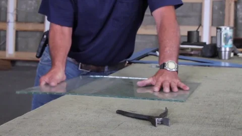 Measuring and Cutting Glass - close-up Stock Footage 83058286