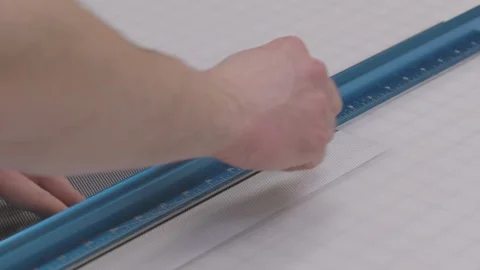 Measuring and Cutting Vinyl with Utility Knife Video stock 87090924