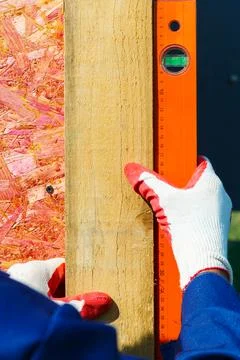 Measuring the angle of inclination in construction. Stock Photos