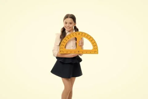 Measuring angles. An important lesson. Little girl preparing for geometry lesson Stock Photos