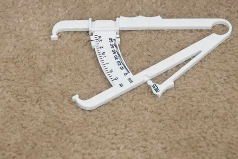 Measuring body fat Stock Photos