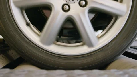 Measuring braking performance on a brake dynamometer after brake repair. Stock Footage 292957106