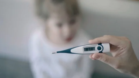 Measuring a Child's Temperature Stock Footage 105625616