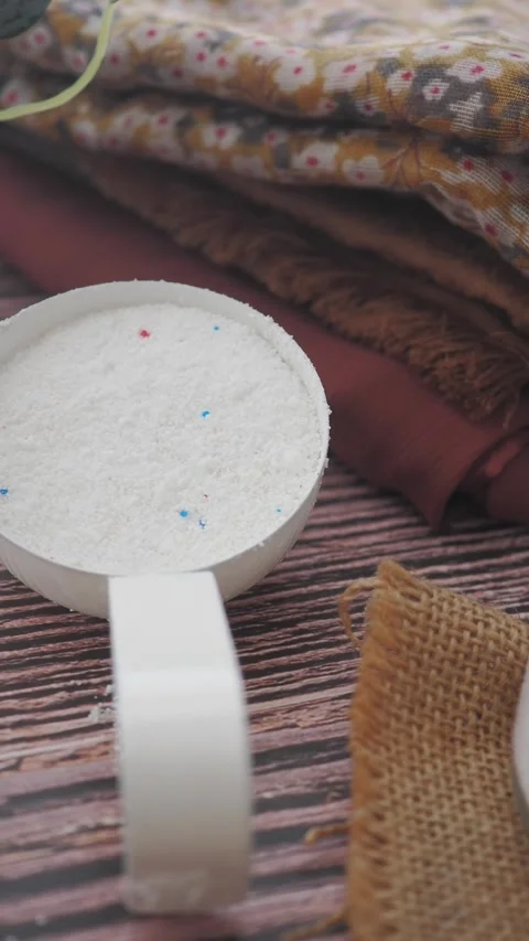 Measuring Cup Filled With Laundry Detergent Powder Stock Footage 347038931