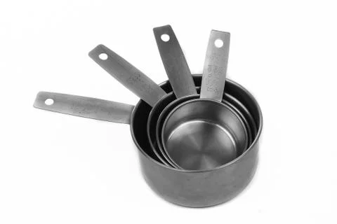 Measuring cups in a fan shape Stock Photos