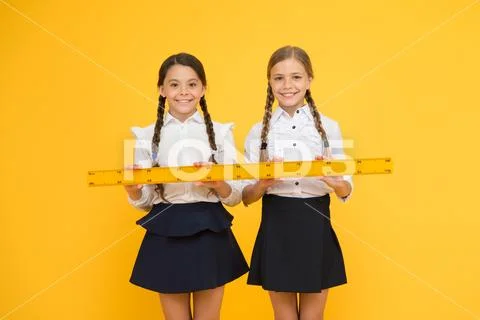 Measuring distance. Measuring equipment. Kids students study math. Knowledge day Stock Photos
