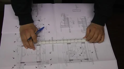 Measuring drawings, plans with a ruler. Vídeos de archivo 48455040
