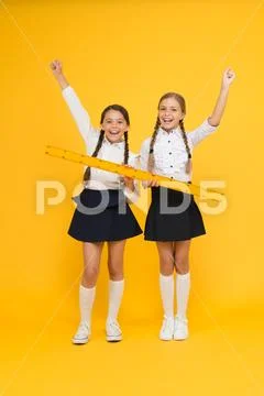 Measuring equipment. Kids students study math. Knowledge day. Schoolgirls school Stock Photos