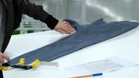 Measuring Of Fabric For trousers Stock Footage 294110935