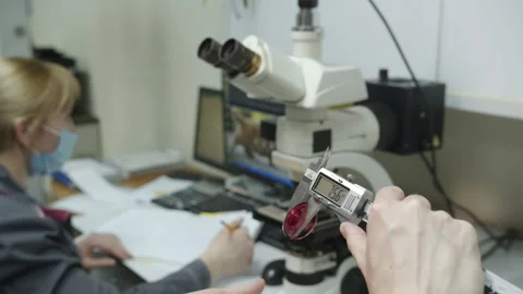 Measuring height of thermal washer using digital caliper Stock Footage 228780095